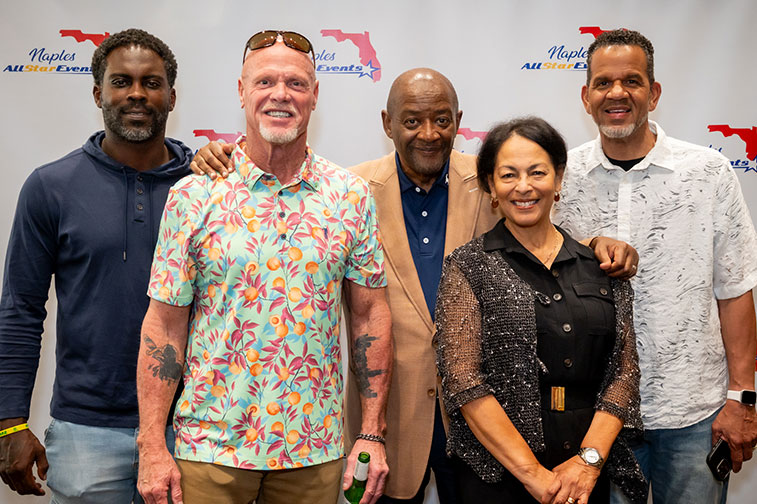 Jim McMahon, Andre Reed and Michael Vick with Michael and Annette Byrd at the Naples All Star Events Legends 7 Event in Naples, Florida
